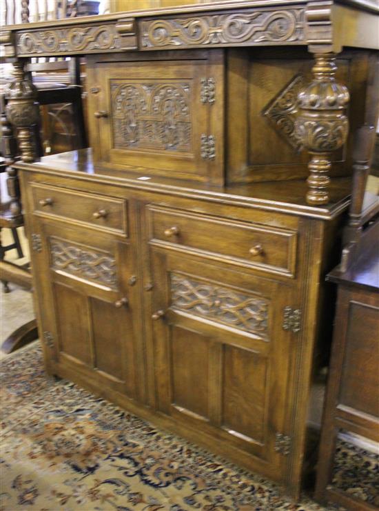 Tudor style carved oak court cupboard